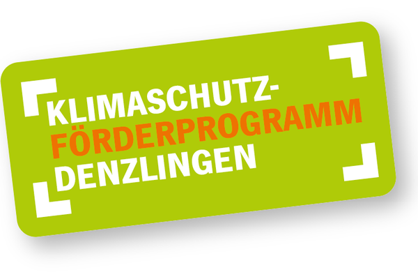 Wei&szlig;e und orangefarbene Lettern auf gr&uuml;nem Untergrund: Klimaschutz-F&ouml;rderprogramm Denzlingen