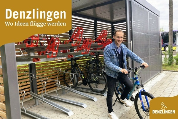 Denzlingen - Wo Ideen flgge werden. Fahrradsammelschlieanlage und Person mit blauem Fahrrad
